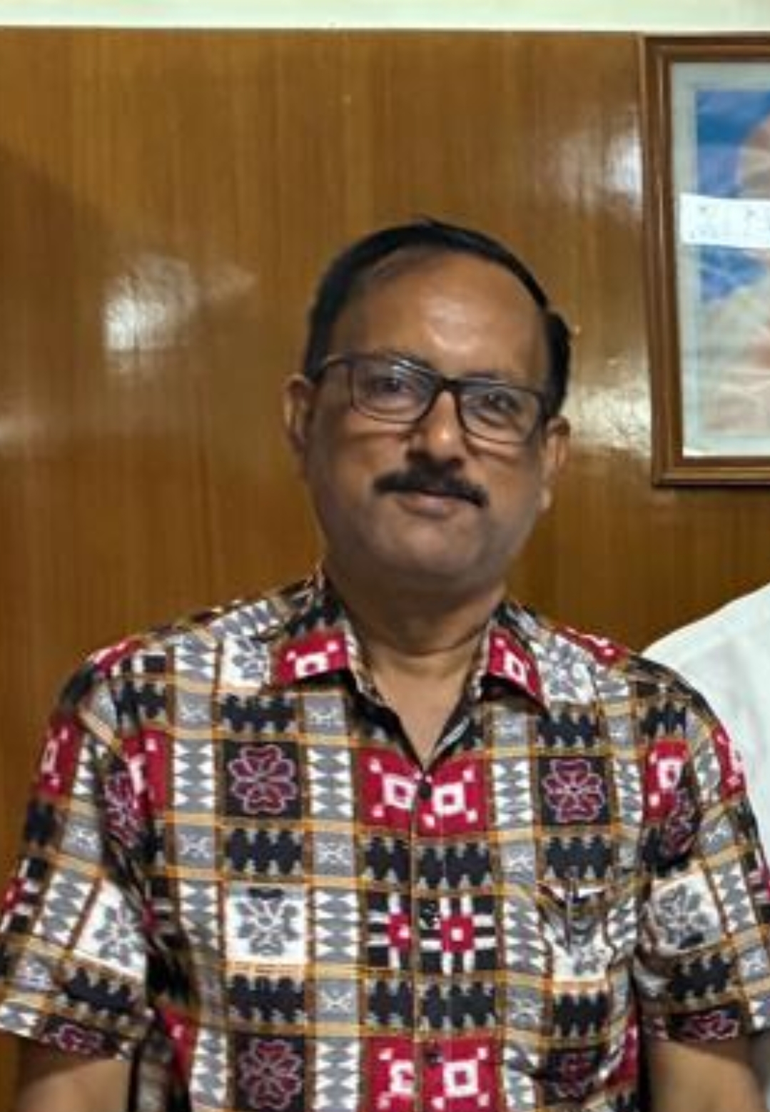 Dr. Alok Adhikari